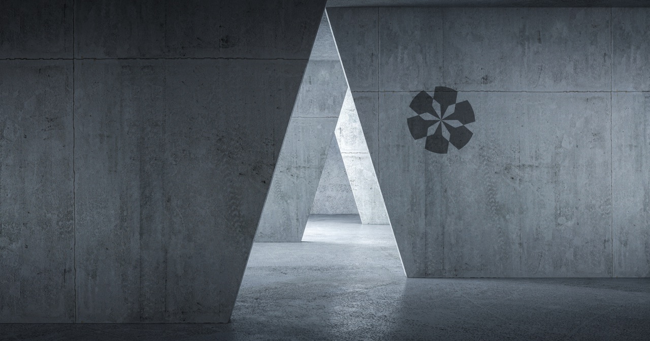 Angled concrete walls in a Brutalist interior, the Hexology pinwheel on the wall to the right